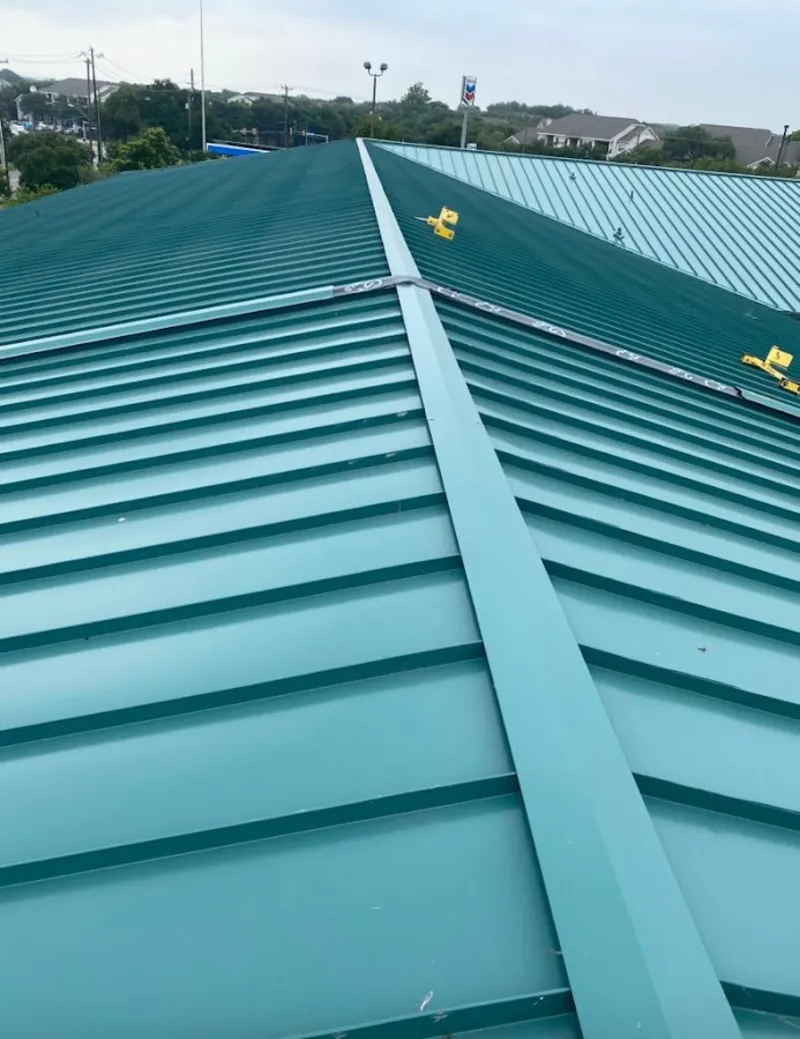 Green commercial metal roof ridge and valley for Metal Roof Repair in Scarborough